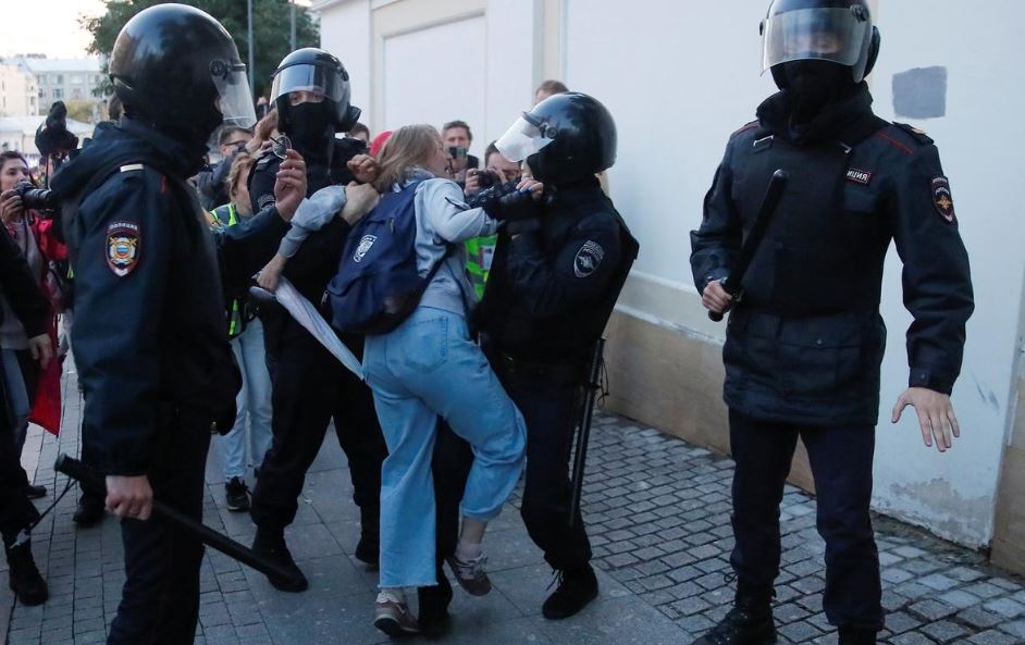 As If Putin Punched A Woman Protester